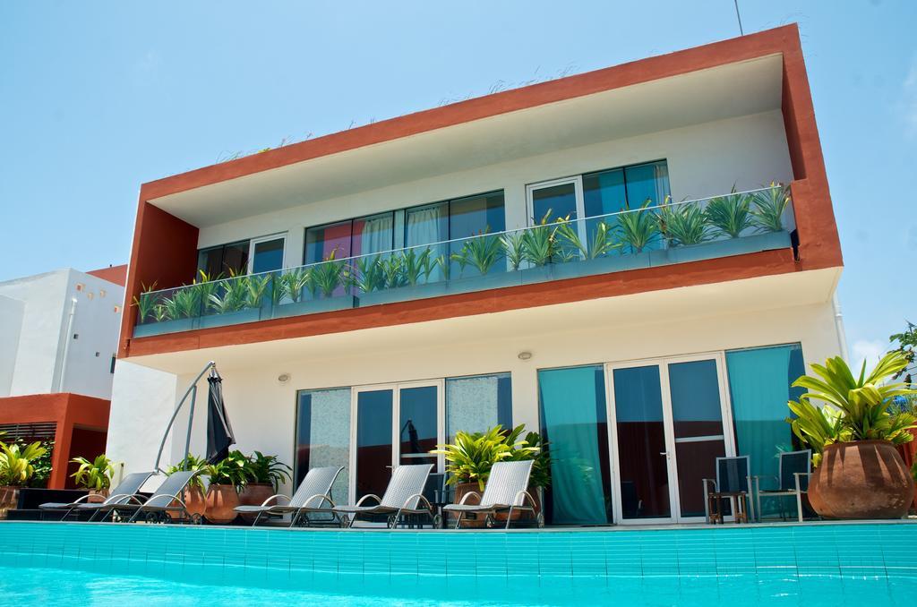 Hotel Maison Rouge Cotonou Quarto foto