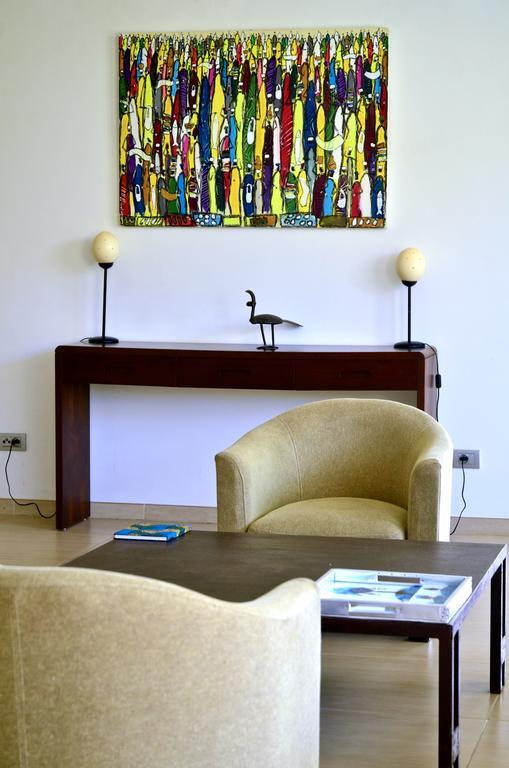 Hotel Maison Rouge Cotonou Quarto foto