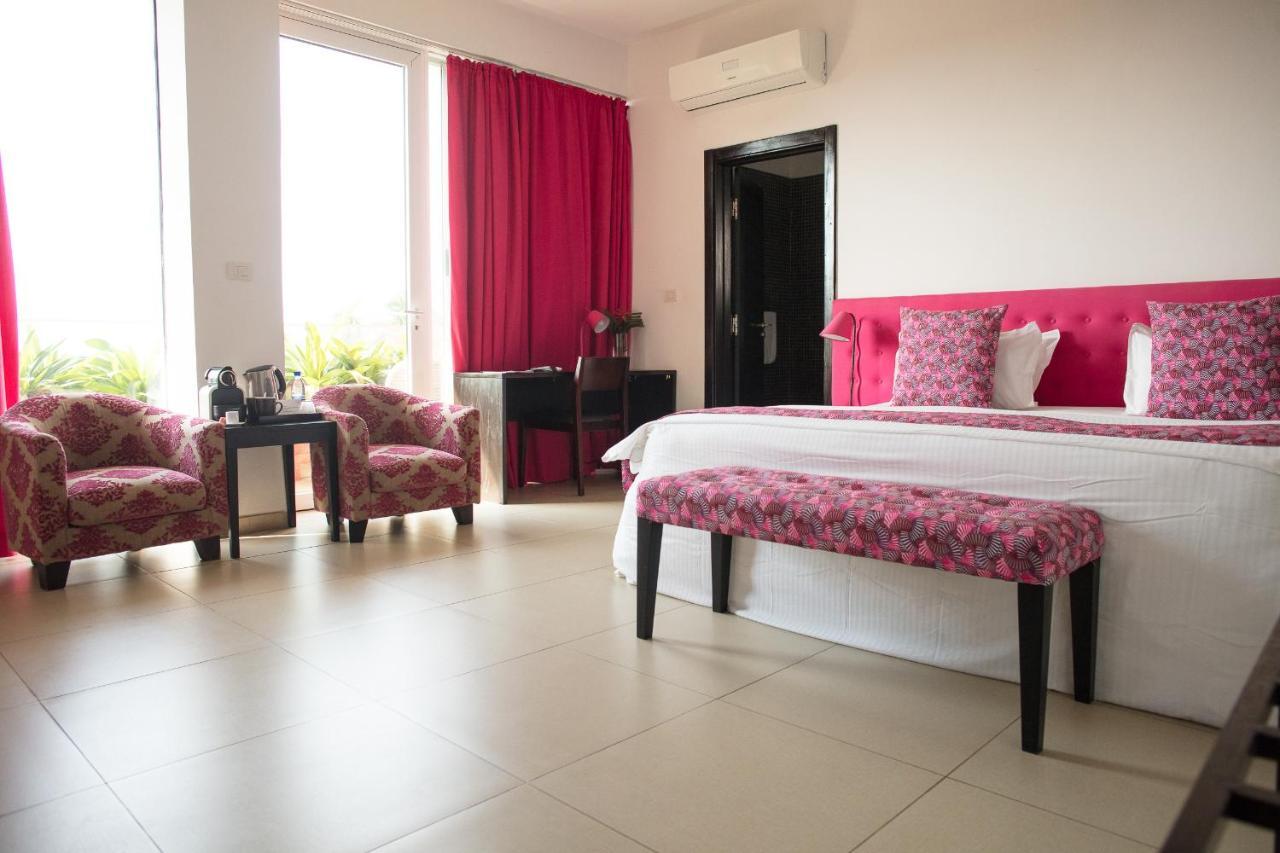 Hotel Maison Rouge Cotonou Exterior foto
